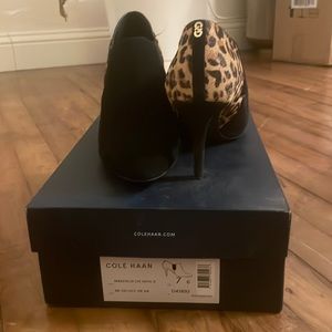 Cole Haan leopard and black heeled booties